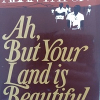 review AH, BUT YOUR LAND IS BEAUTIFUL